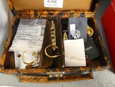 Vintage jewellery box containing earrings