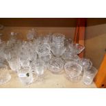 A large selection of cut glass crystal utensils including various Waterford cut glass, tumblers, wat