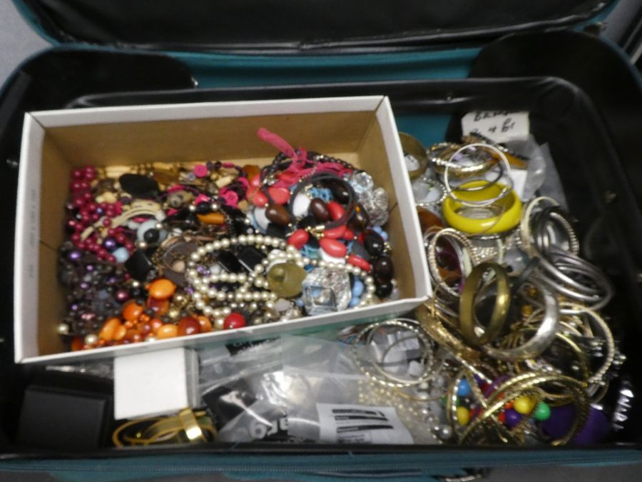 Suitcase containing a quantity of costume jewellery