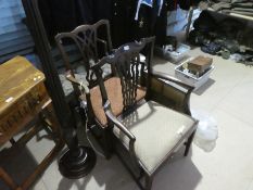 Three antique mahogany open armchairs and a Victorian mahogany standard lamp