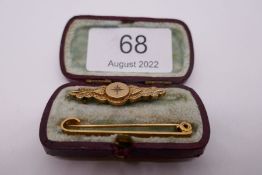 9ct yellow gold bar brooch together with a Victorian brooch with central starburst diamond chip both