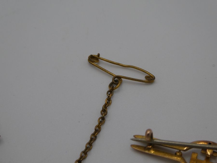 Three 9ct yellow gold brooches two of wishbone design, all marked 9 carat, 3g - Image 7 of 8