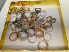 Tray of modern sliver dress rings some rose gold plated silver, pearl dress ring etc