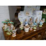 Eleven large Royal Albert Beatrix Potter figures and three similar Beswick examples (mainly boxed) (