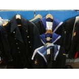 A quantity of vintage Naval uniforms, post 1950 and a tray of similar