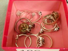 Collection of modern silver dress rings to include cluster examples