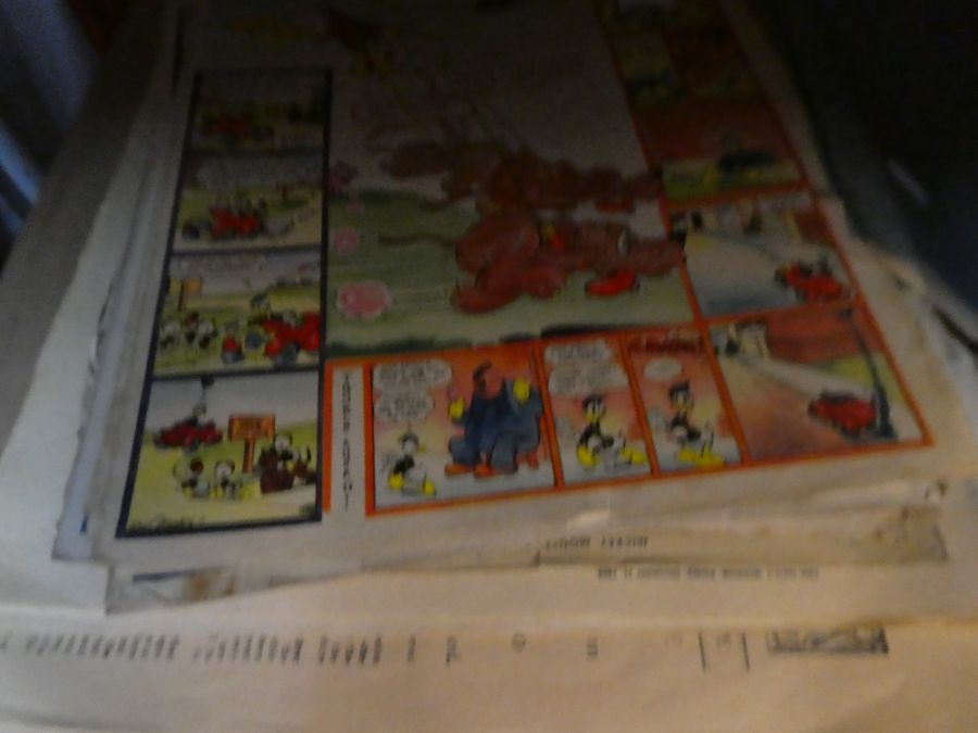 A small quantity of Mickey Mouse comics from the 1940s and a quantity of old newspapers, 2th century