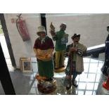 Three Royal Doulton figures to include; Punch and Judy Man HN2765, The Farmer's Wife and The Laird.