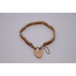 9ct yellow gold decorative gatelink bracelet with heart shaped clasp and safety chain, clasp not att