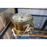 A brass bulkhead ships clock by Elliot