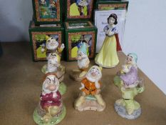 A Royal Doulton set of Snow White and the seven Dwarfs, limited edition 423/2000, all boxed with cer