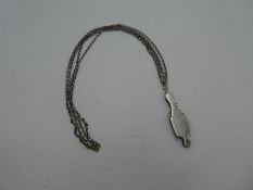 An exceptional sterling silver lorgnette, decorative case having foliate border and folding spectacl