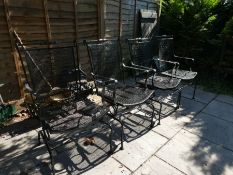 A set of 4 black painted metal garden chairs