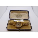 Antique 18ct yellow gold cased watch on expanding plated strap, winds and ticks, marked 18ct London,