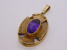 9ct yellow gold Oval amethyst pendant, 30mm x 20mm, Import mark London, maker GS, 5.7g approx