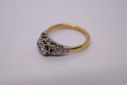 Antique 18ct yellow gold illusion set diamond ring mounted in platinum with floral split shoulders,