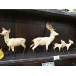 A set of four Beswick Deer figures