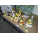 Fifteen Royal Doulton Winnie the Pooh figures, mostly boxed