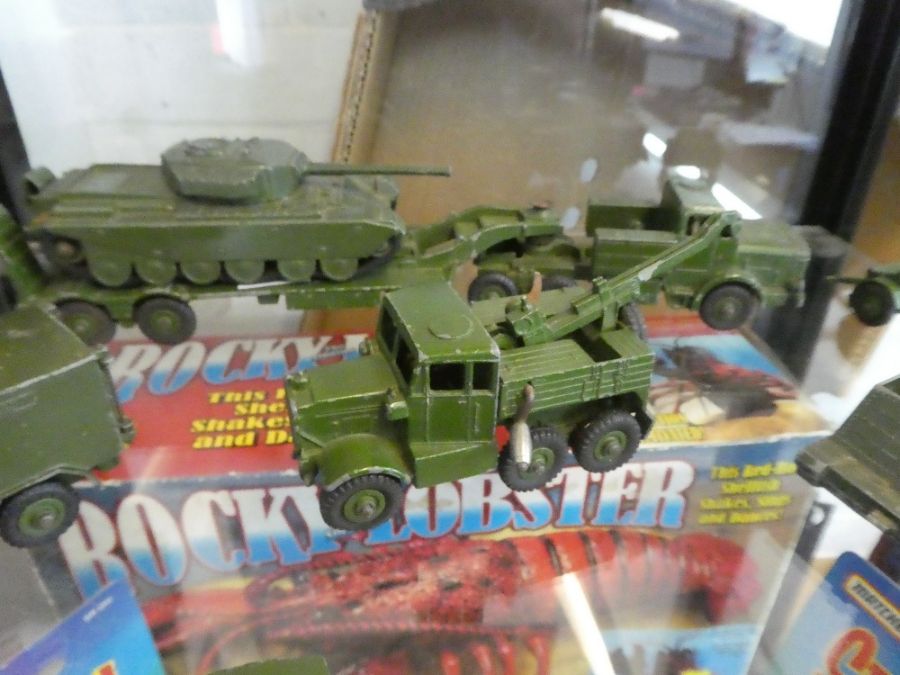 A shelf of die cast military vehicles by Dinky, and a Lone Star - Image 4 of 4