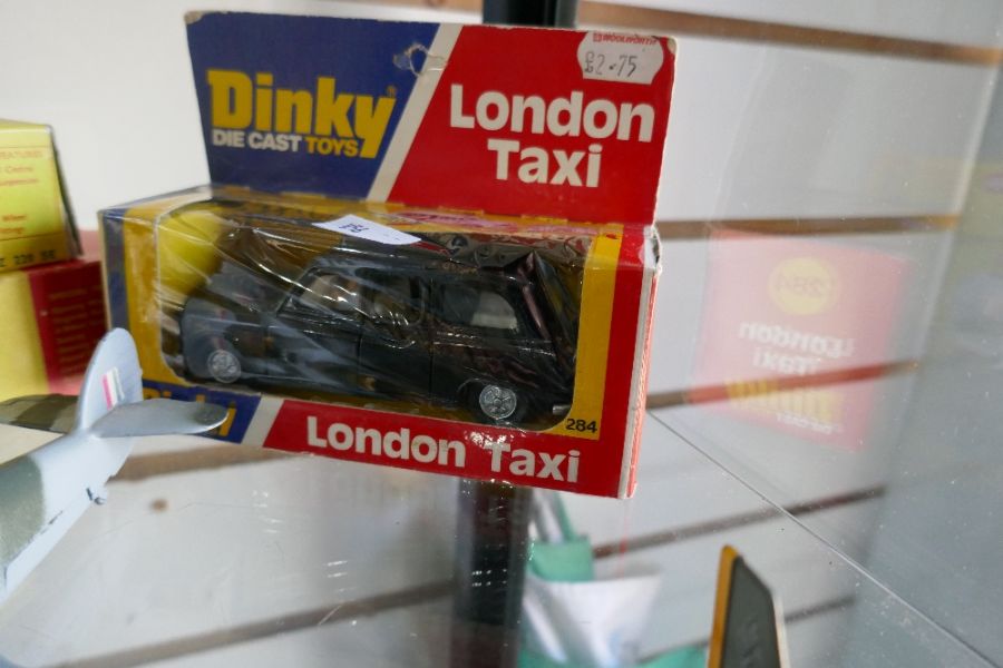 A selection of Dinky toys No 186 and 198, a taxi and 2 WWII aircraft - Image 2 of 4