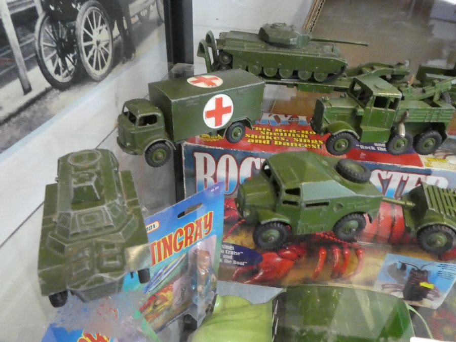 A shelf of die cast military vehicles by Dinky, and a Lone Star - Image 2 of 4