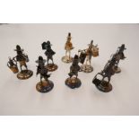A quantity of eight sterling Chinese figures of Fishermen and traders, 6cm high approx. Mostly marke
