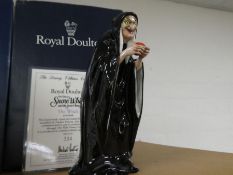 A Royal Doulton figure of The Witch from Snow White and the seven dwarfs, HN3848, limited edition 33