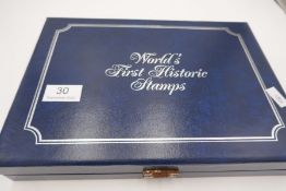 The 'World's First Historic Stamps' set of 24 silver medals - 18 ozt approx