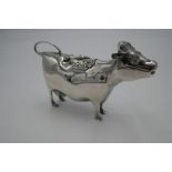 20th Century silver cow creamer by William Comyns and Sons Ltd, modelled as a standing cow with hing