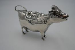 20th Century silver cow creamer by William Comyns and Sons Ltd, modelled as a standing cow with hing