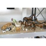 A quantity of Beswick animals to include 6 brown horses and a Beswick Woodpecker