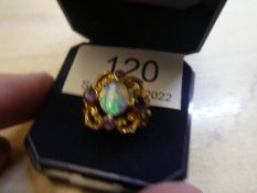 9ct yellow gold decorative ring with central opal and 4 amethyst in scrolling panel mount, size P, 5