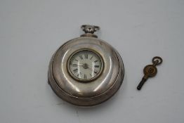 A silver William IV pocket watch having a matching silver case, hallmarked Birmingham 1835, J.W. wit