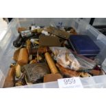 A tray containing thimbles, sewing related items and sundry