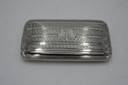 A silver Victorian ornate trinket box having decorative line pattern with foliate scrolls and gilt i