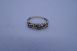 9ct yellow gold ring with decorative plait top inset diamond chips, size R, marked 375, 2.2g approx