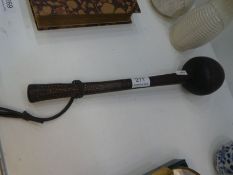 An old African knob Kerri having carved zig zag handle, 40cm