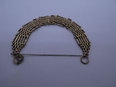 9ct yellow gold six bar gate link bracelet with safety chain, marked 375, approx 22.2g