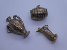 Three 9ct yellow gold charms to include, barrell, jug and egyptian urn, all by Fred Manshaw Ltd., Lo