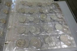An album of GB coins, mainly 20th century and pre-decimal