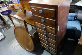 A pine filing chest, having 8 drawers