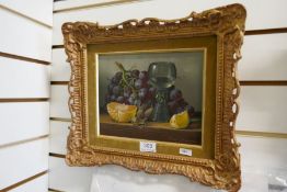 A pair of still life oils of fruit and glass by Brian Davies, signed 24.5cm x 19.5cm