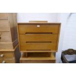 A pair of Stag 1970s chest of drawers on turned legs, 76cm