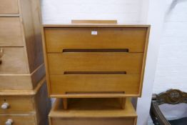 A pair of Stag 1970s chest of drawers on turned legs, 76cm