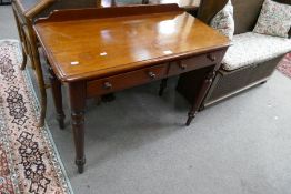 A Victorian mahogany 2 drawer side table on turned legs, 97cm