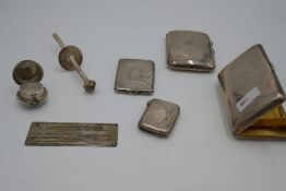 A London 1883 silver Sampson Mordan and Co cigarette case having gilt interior, and another with a V