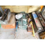 Two shelves of mixed tools, tool boxes and similar