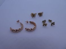 Three pairs of 9ct gold earrings to include pair of rose gold hoops and 2 pairs of stud earrings, on