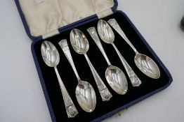 A set of silver handled Walker and Hall knives and forks Sheffield 1920s. Also with two cased sets o