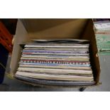 A small box of vinyl LPs, mainly 80s